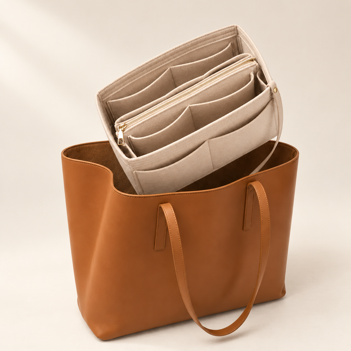 TravelPack Bag Organizer insert lifted into a brown tote bag
