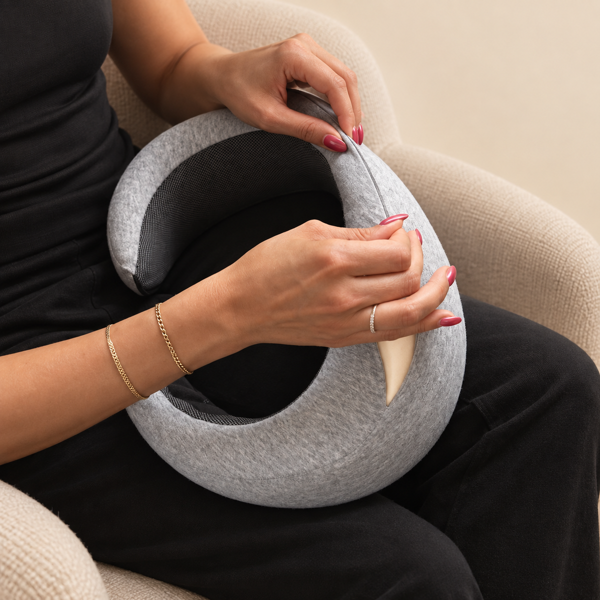 Opening the zipper on the DreamCatcher travel pillow